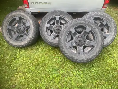 Selling a set of rockstar rims and Toyo open country tires. Comes with aftermarket lugs nuts too. 8x...