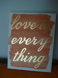 Cadre orange et blanc avec message Love is everything