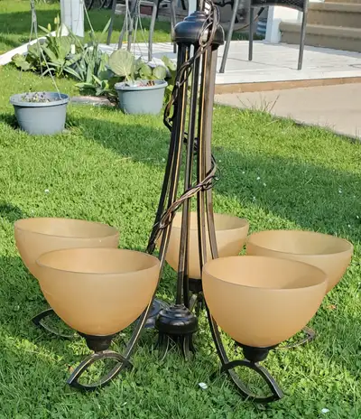 If you see this Ad is up, it's still available. 5 Light Bronze Finished Metal Chandelier with Froste...