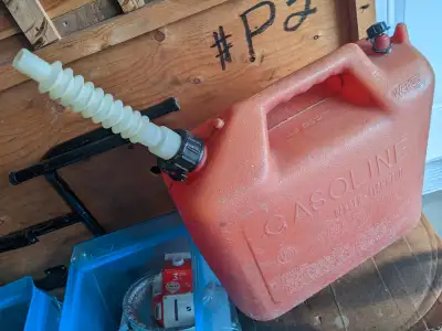 Good used with spout , cap & cover . No cracks or leaks . $ 10.00