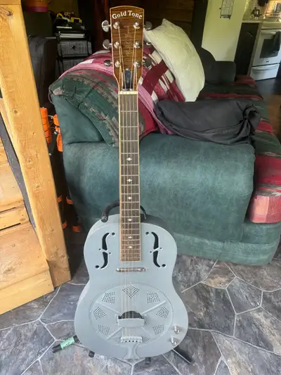 Gold Tone Paul Beard Steel Body Resonator Guitar in like new condition. For more information and ret...