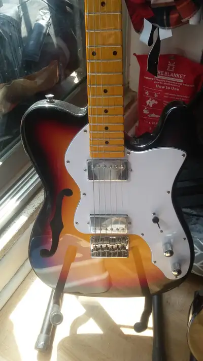 2 Donner thinline electric guitars., View more