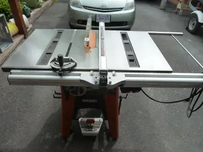 This heavy duty table saw was used for home carpentry projects only and was never used on a building...