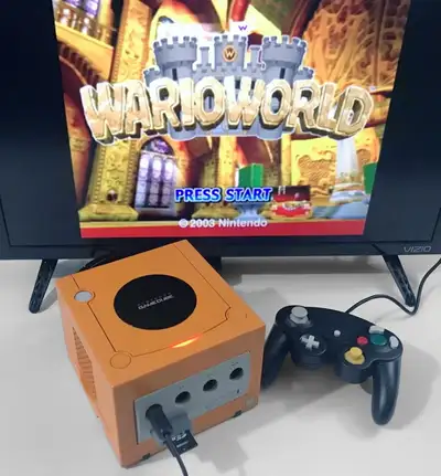 Orange GameCube with complete library (HDMI an option), View more