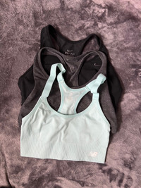 Set of three brand name, like new soft sports bras, size small 