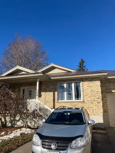 Entire house for rent in Mitchell. 3+1 bed, 2 bath. Central Air, attached garage, double wide drivew...