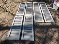 6 Blue/Grey P.V.C. shutters for your home in good condition.