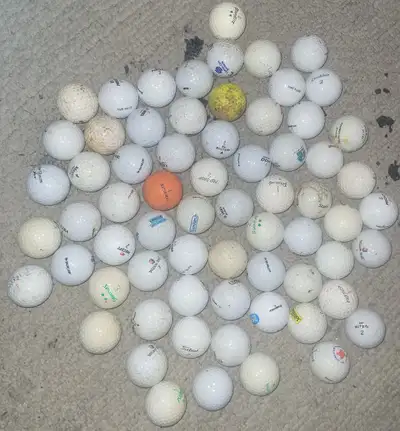 67 golf balls for $40. Golfing. Sports. I deliver!, View more
