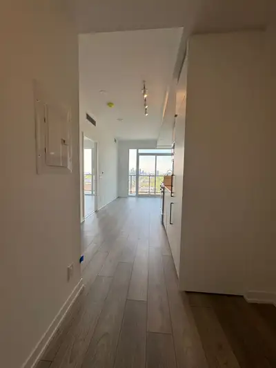 1 + Den Condo