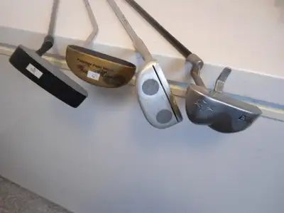 FOUR LEFT HANDED GOLF PUTTERS  1, View more