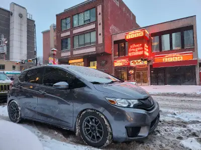 Testing the waters with my tastefully modified and well maintained Honda Fit LX with the 6 speed man...