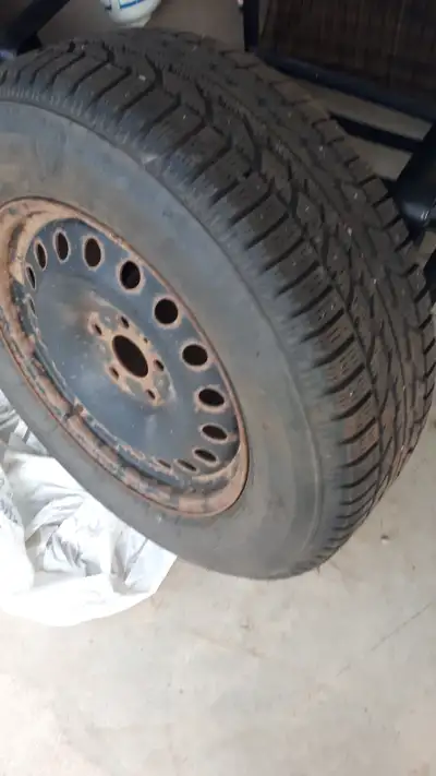 4 Firestone Studded winter tires on rims Size 265/60R 18 .Tires were on a Jeep Grand Cherokee. Vehic...