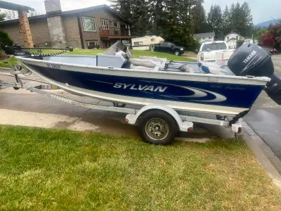 16ft aluminum fishing boat. 50hp Yamaha 4 stroke outboard and electric bow mounted trolling motor. C...
