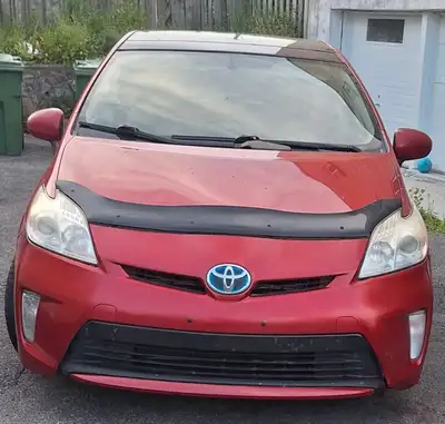 2014 Toyota Prius Automatic. It has air conditioning, power door/mirror/window, cruise control, Blue...