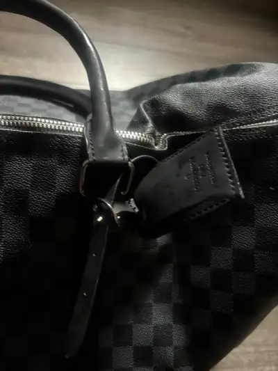 This is a used Louis Vuitton duffle bag, in good condition and ready for your next adventure! This s...