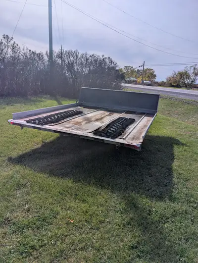 Make an offer I want it gone...2 sled, extra wide, extra long, tilting, snowmobile trailer for sale....