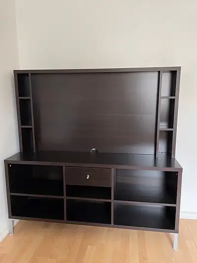 Used Ikea TV stand, perfect for your living room setup! It features a sleek design with multiple she...