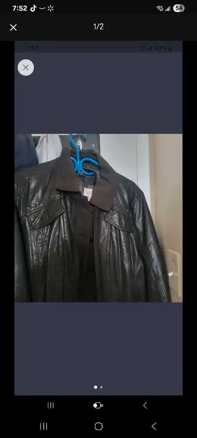 Selling brand new leather jacket size large tag on the picture