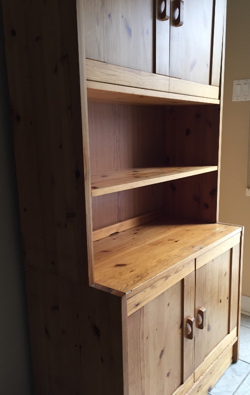 Wood / bookcase upper and lower portions have doors