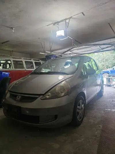 Honda Fit 2008 Selling as is OBO 1 set summer tires 1 set winter tires with rims Missing driver side...