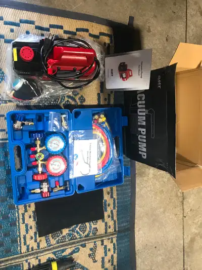 OMT 4.5 CFM Vacuum Pump and Gauges bought as a back up last year never used. asking $125