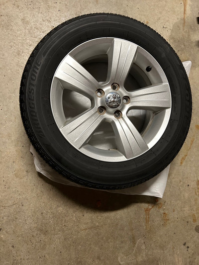 Bridgetone  Tire  w/Rims (215/60/R17) from Dodge Calibet