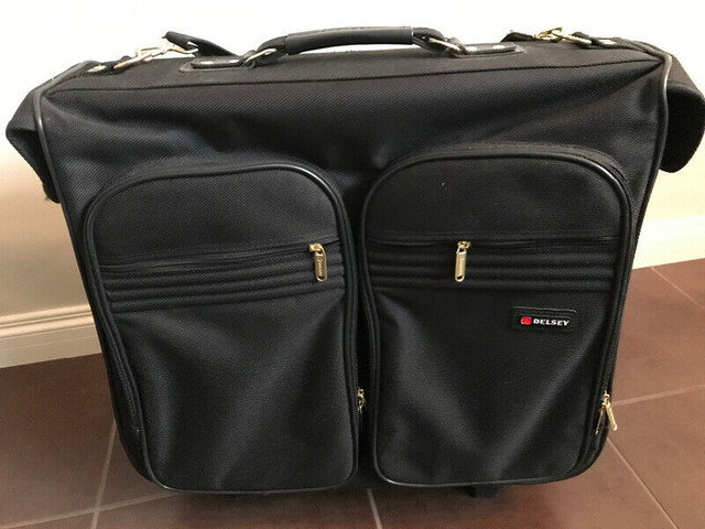 Delsey Black Garment Luggage With Wheels in Other in Calgary