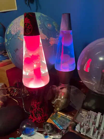 Both in mint condition. Blue one is $10 red one is $25 or both for $30