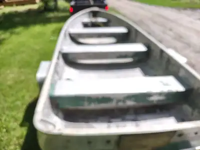 14' aluminum fishing boat. Older Alumacraft. Boat only. Solid , no leaks . Good condition. Text or c...
