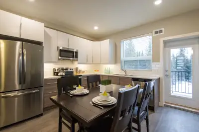 New building on a quiet cul-de-sac in Whistle Bend. This modern-style executive townhouse has a thre...