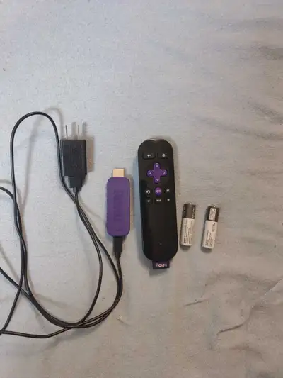 Enjoy endless entertainment with this used Roku Streaming Stick, delivering seamless access to your...