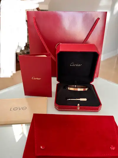 Cartier rose gold love bracelet size 18. In excellent condition. Comes with shopping bag, inner box,...
