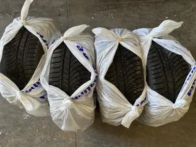 4 used Kumho winter tires 235/40 R19 About 40% tread Off of a Ford Fusion Sport They were about $500...