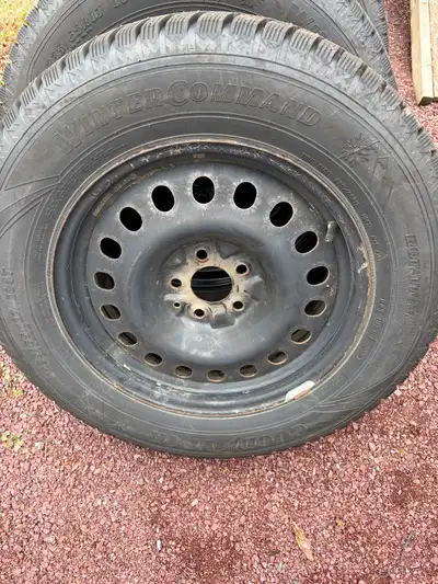 For Sale- 4 Goodyear winter studded on Honda CRV rims lots of tread
