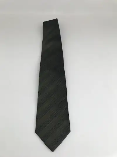 New, never worn silk Italian crafted designer tie. Dark green with black stripes. Pick up in the War...