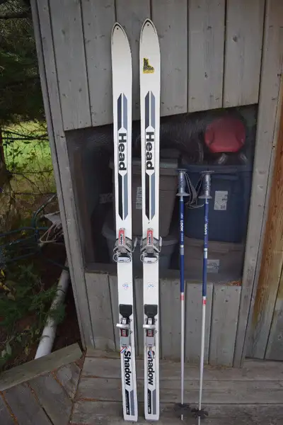Down hill skis & poles, View more