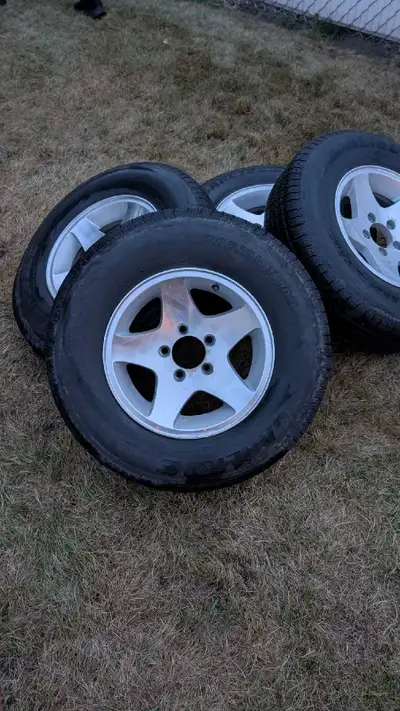 4 alum trailer tires Carlisle st205 75 R14 in good shape $700 for all of it and good rims if you're...