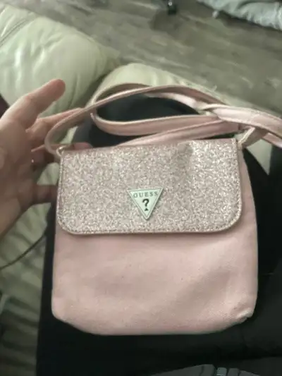 Girls guess purse