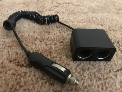 Selling a 2-way car cigarette light splitter in good used condition. It is equipped with a replaceab...