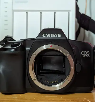 I am selling the following item(s): - Canon EOS 850 SLR Automatic 35mm Film Camera Body - CR2 lithiu...