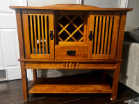 Solid wood side table with wine rack. Monarch Specialties Inc.