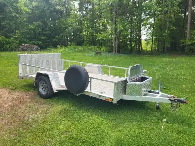 Custom made all aluminumtrailer 6 x 14. Only used once to haul a Can Am Spyder out east (also for sa...