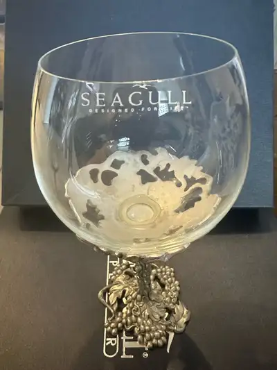 This is a striking Seagull Pewter Goblet, perfect for adding a touch of elegance to any occasion. Th...