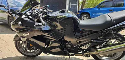 Selling my 2007 Kawasaki ZX-14, a high-performance motorcycle with a powerful engine and sleek desig...