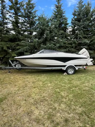 This boat has an Evinrude 175E motor and comes with an EZ load trailer. Excellent condition, reason...