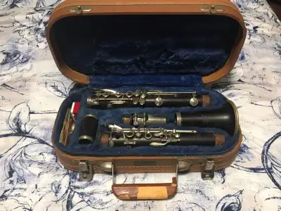 Rare vintage solid wood clarinet made by Ambassador for FE Olds & Son, Fullerton, California. It com...