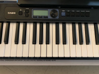Clavier piano Casio professionnel avec accessoires 