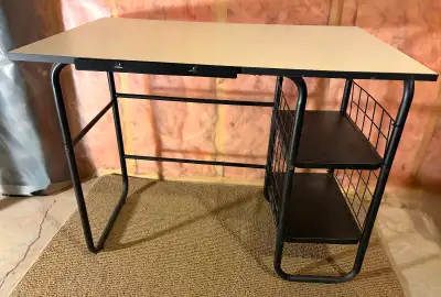 White, laminate top and black metal base. 2 removable shelves on right side, which can be re-positio...