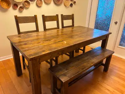 Heavy wood table with bench and 3 chairs. Seats 8 comfortably. Table has some marks in top as seen i...