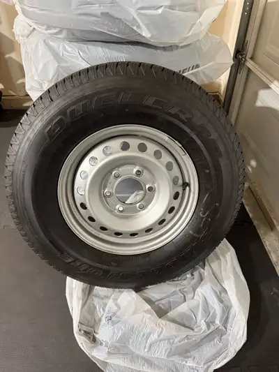 5 Bridgestone Deuller H/T Tires on Rims [NEW]. Size 255/70R16. 6 Bolt Rims. Located in Langley just...